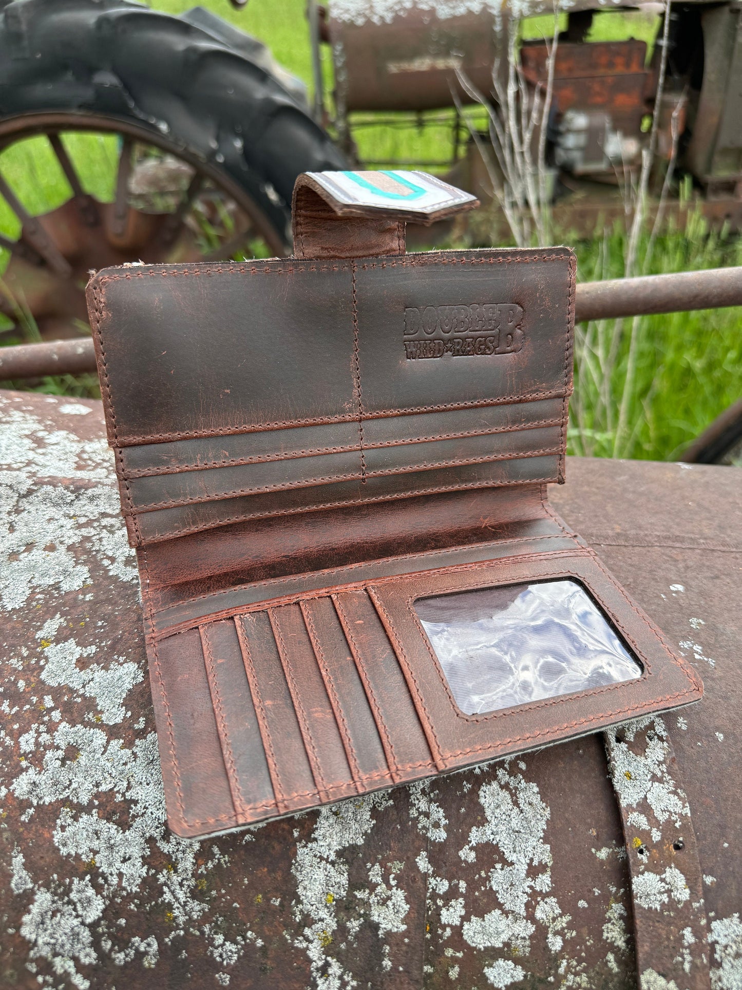 Genuine Western Cowhide Leather Purse and Wallet with jagged painted details and black fringe.