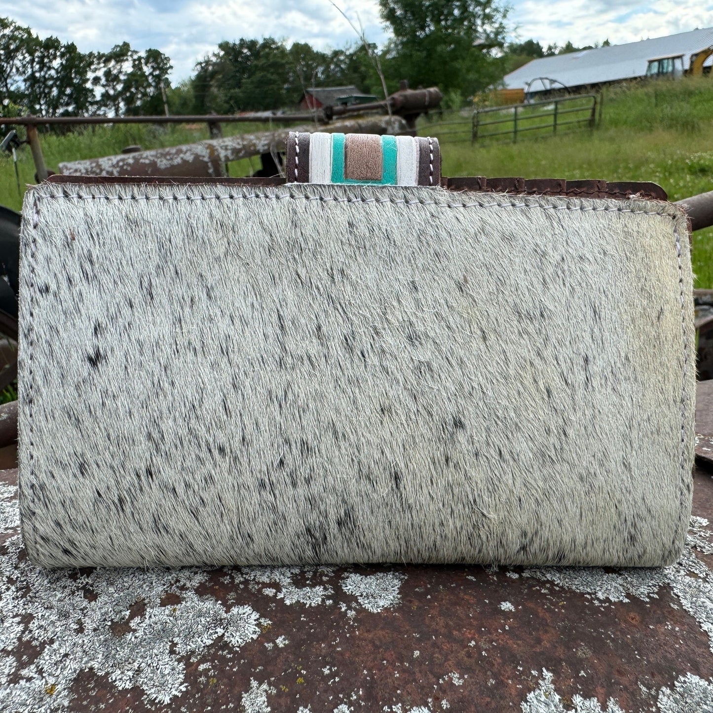 Genuine Western Cowhide Leather Purse and Wallet with jagged painted details and black fringe.