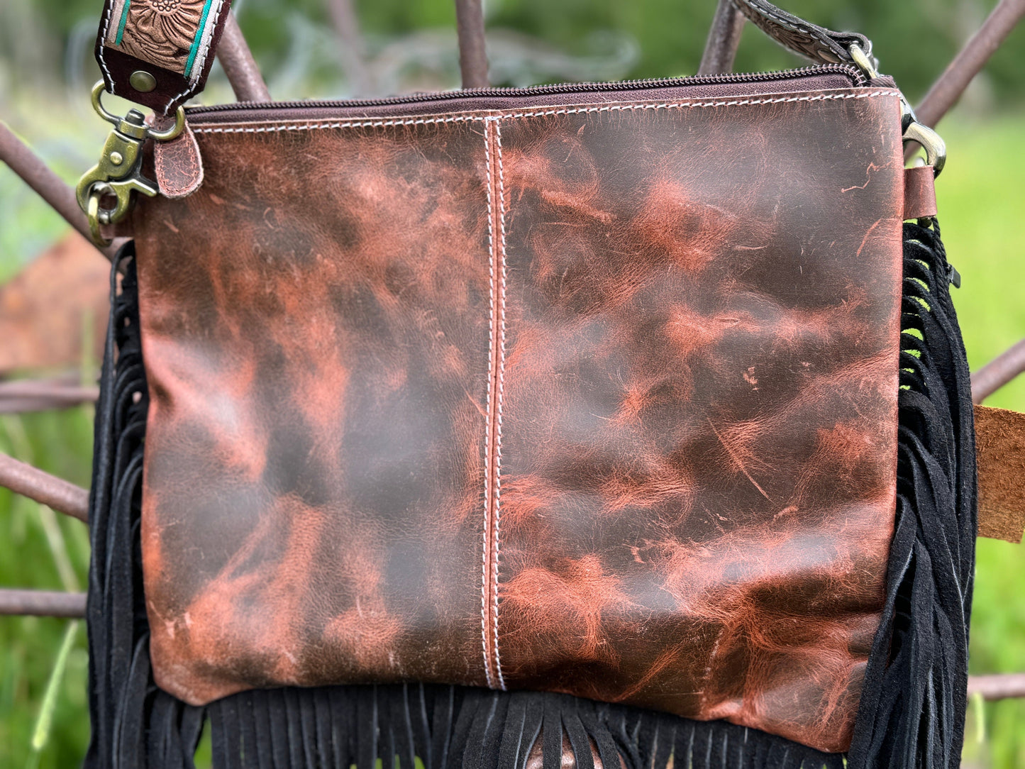 Genuine Western Cowhide Leather Purse and Wallet with jagged painted details and black fringe.