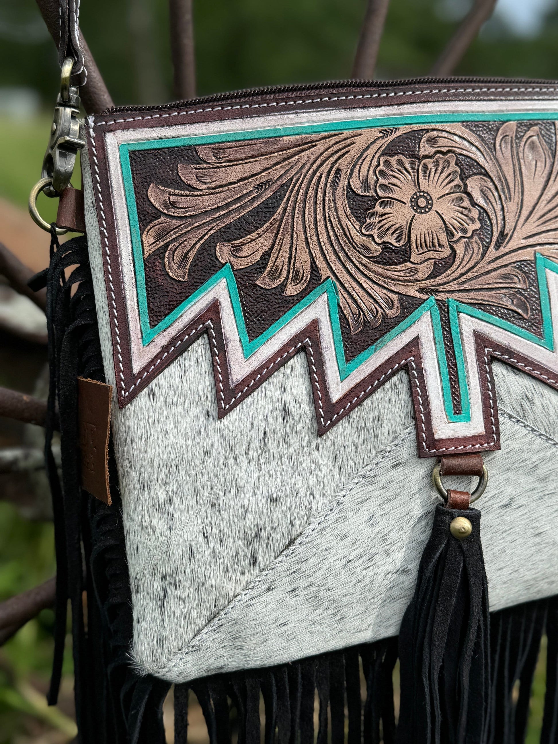 Genuine Western Cowhide Leather Purse and Wallet with jagged painted details and black fringe.