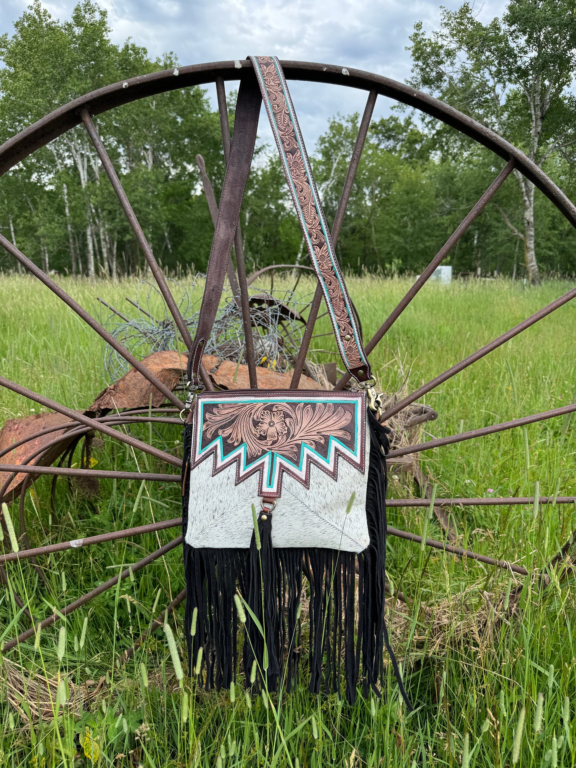 Genuine Western Cowhide Leather Purse and Wallet with jagged painted details and black fringe.
