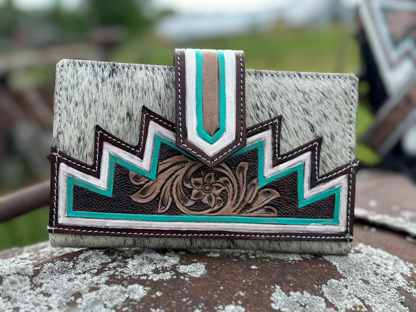 Genuine Western Cowhide Leather Purse and Wallet with jagged painted details and black fringe.